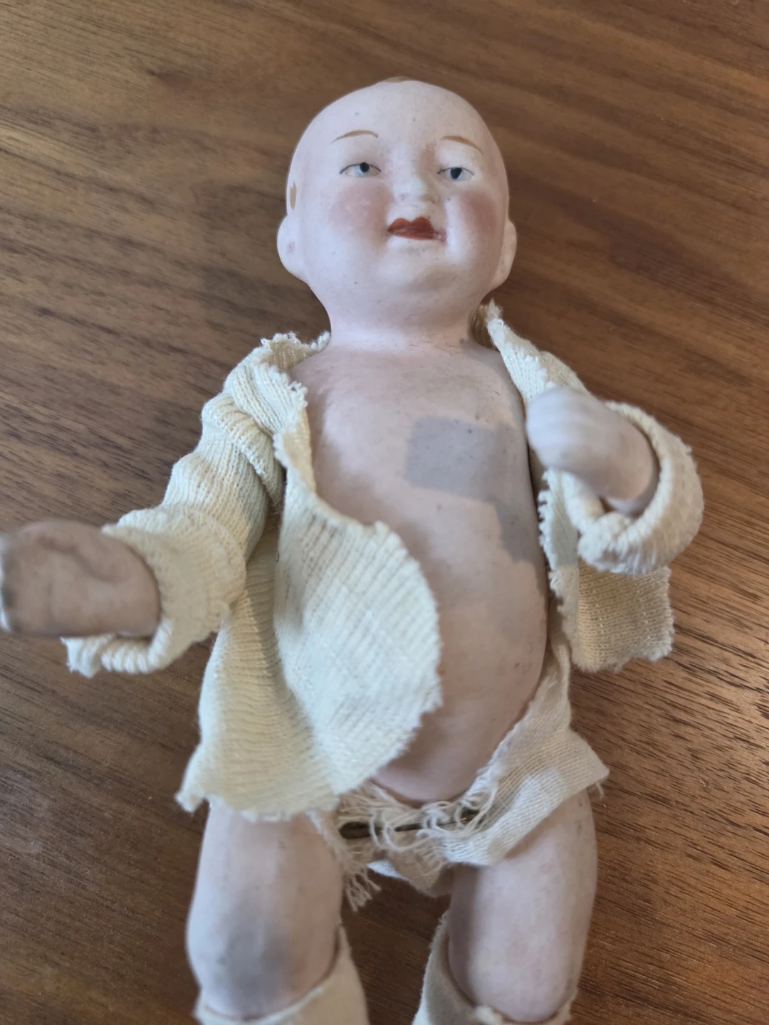 Antique kiwi porcelain baby doll