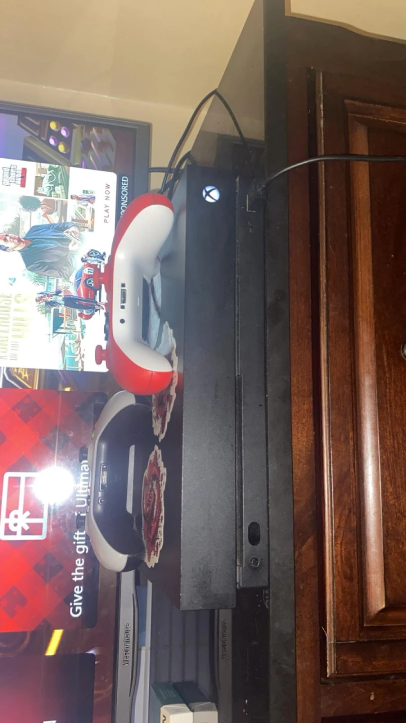 Xbox one x 1tb comes with 21 games and 2 controllers