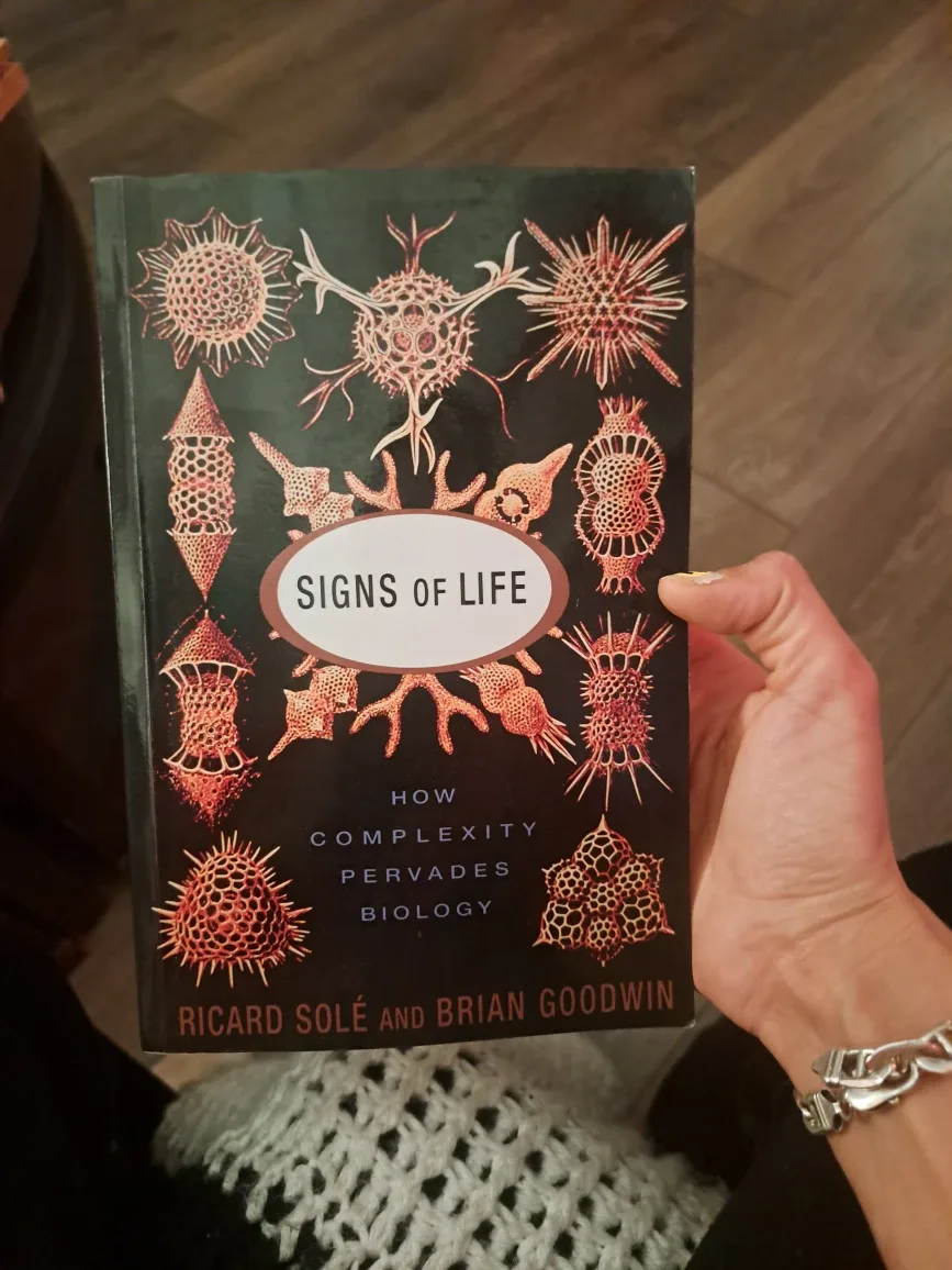 Signs of Life: How Complexity Pervades Biology