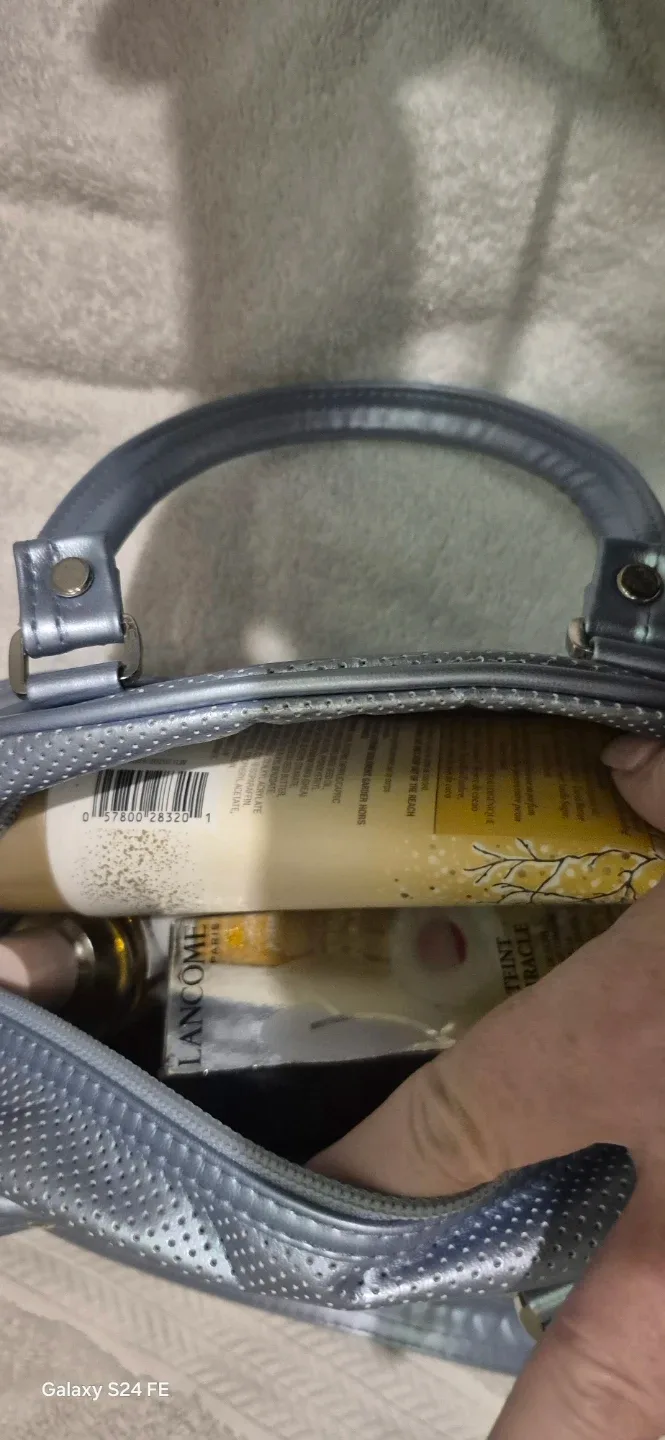 Puma bag , filled with all new perfumes  and lotions image indicator(8)