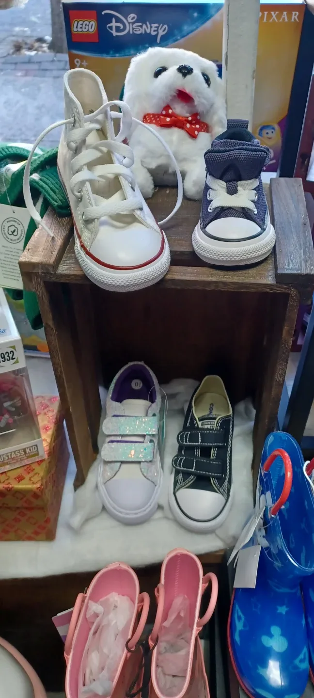Kids' UGG boots, converse sneakers, and rainboots