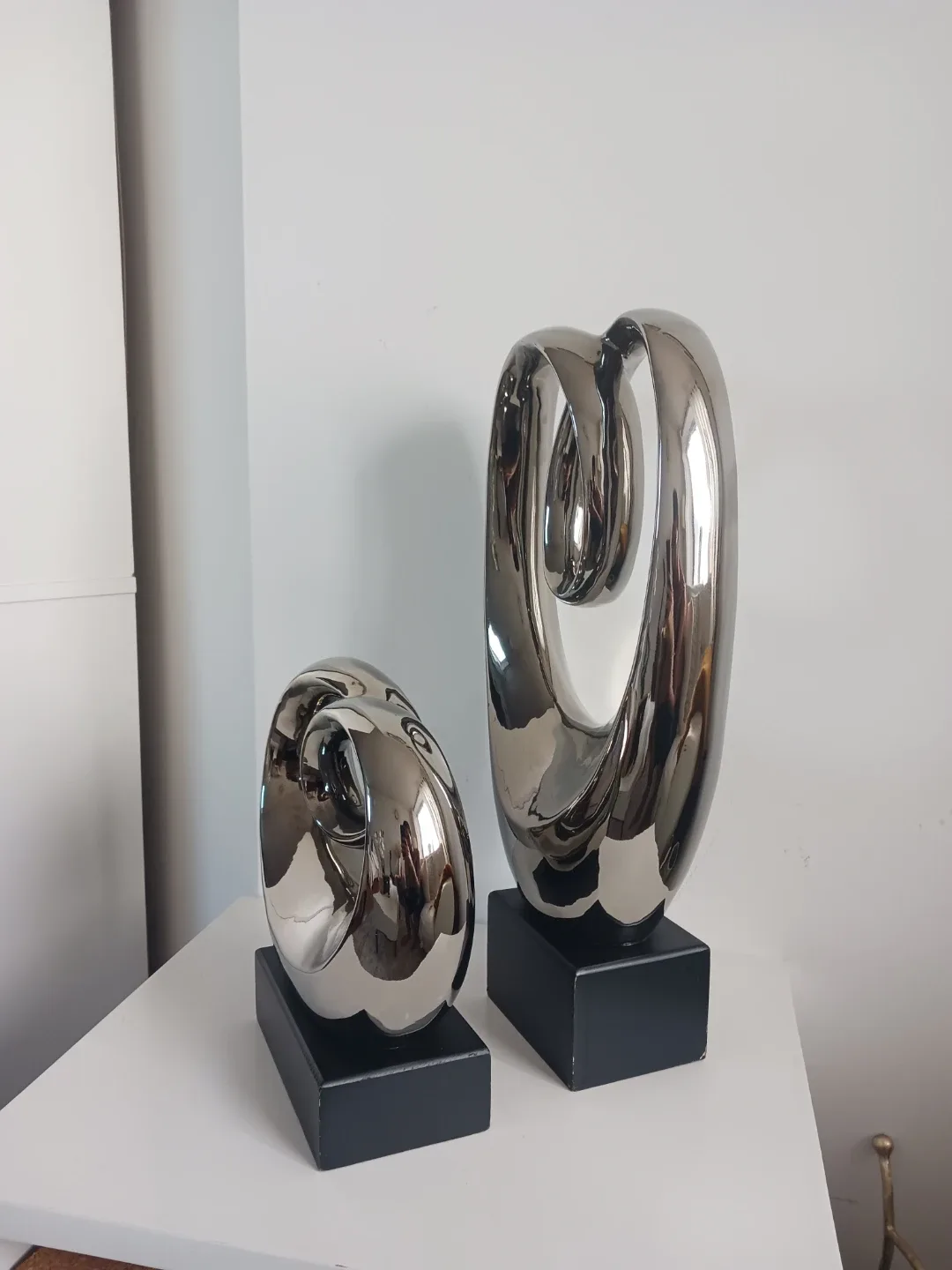 Entwined Elegance: Chrome Abstract Sculpture Set image indicator(2)