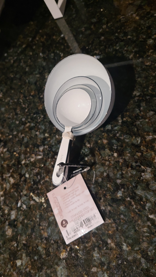 Brand New Celebrations Stainless Steel Measuring Cup Set