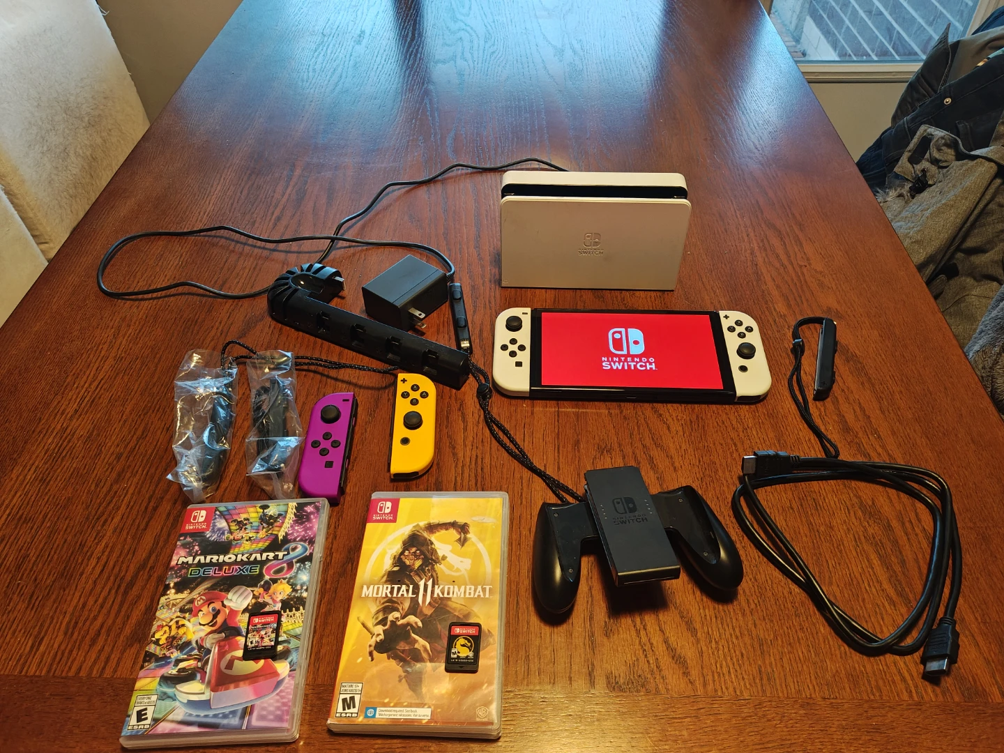 Nintendo Switch OLED Model with Games