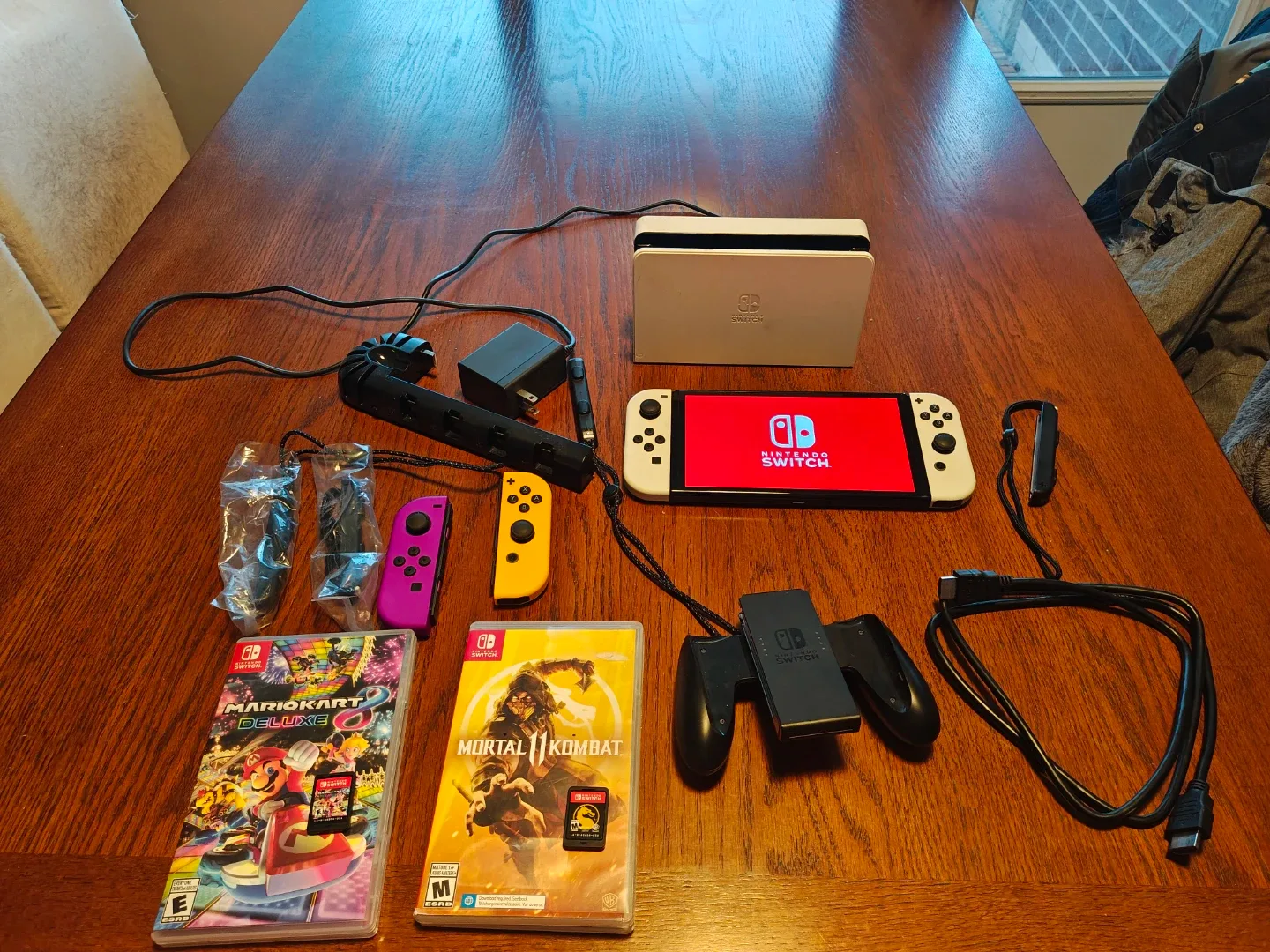 Nintendo Switch OLED Model with Games