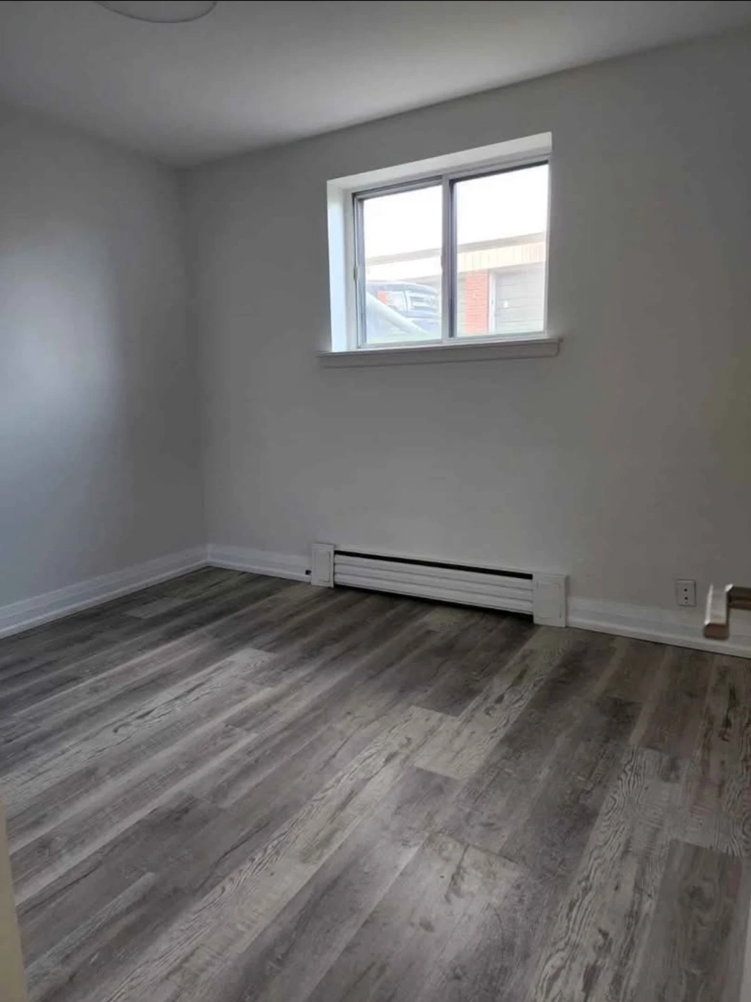 Private Room in a 3 bedroom basement level apartment