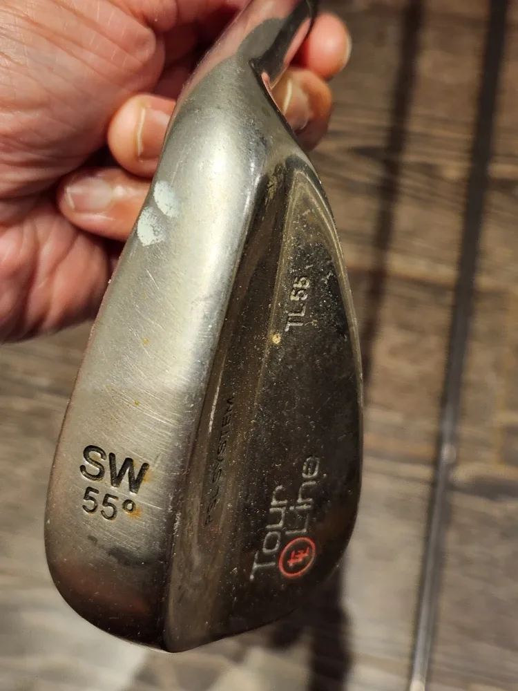 Taylor Made and TL Golf Clubs, Titleist & UA Gloves, and 2 balls image indicator(2)