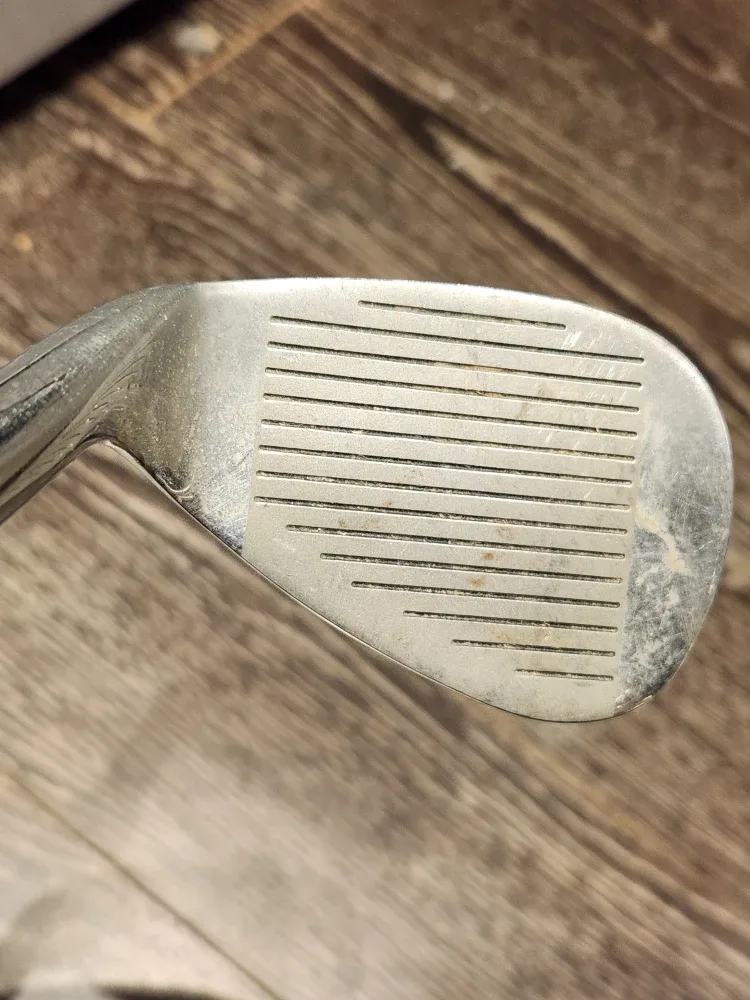 Taylor Made and TL Golf Clubs, Titleist & UA Gloves, and 2 balls image indicator(4)