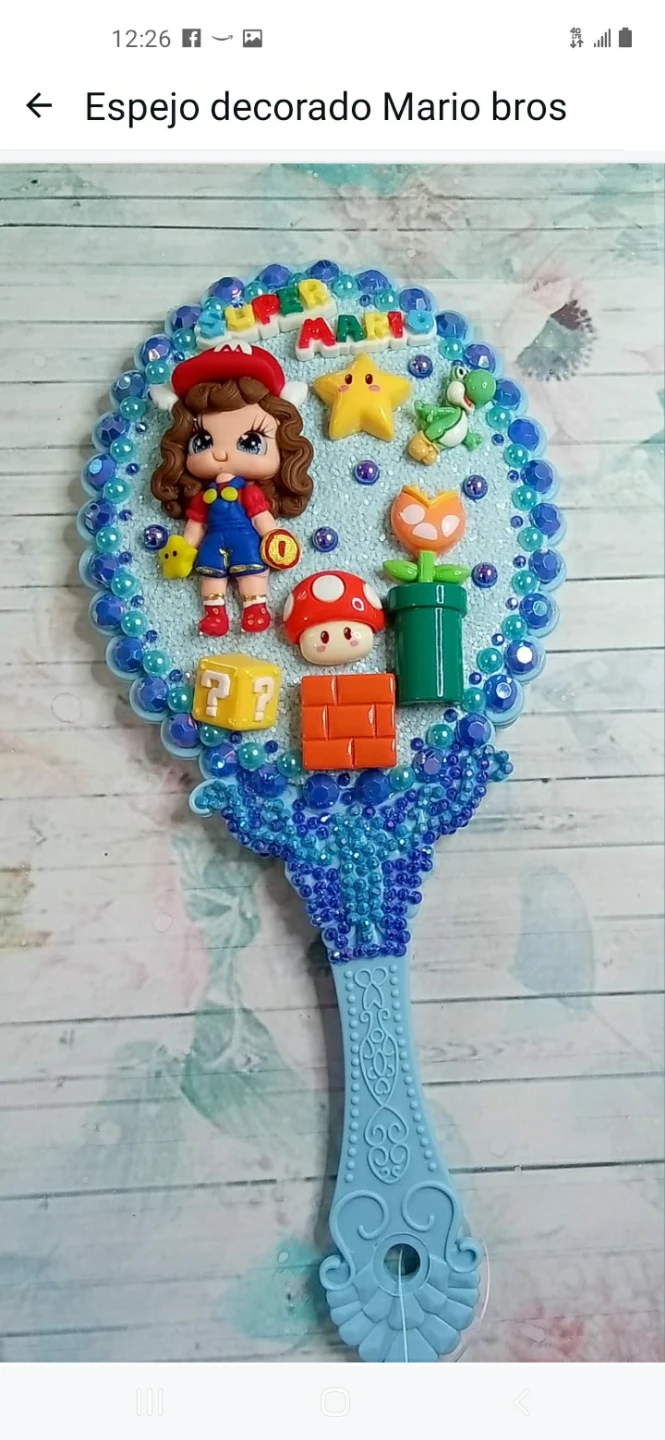 Espejo decorado, hand mirror
