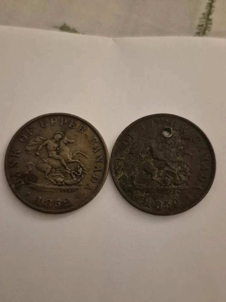 Pair of 1852 Bank of Upper Canada half penny tokens