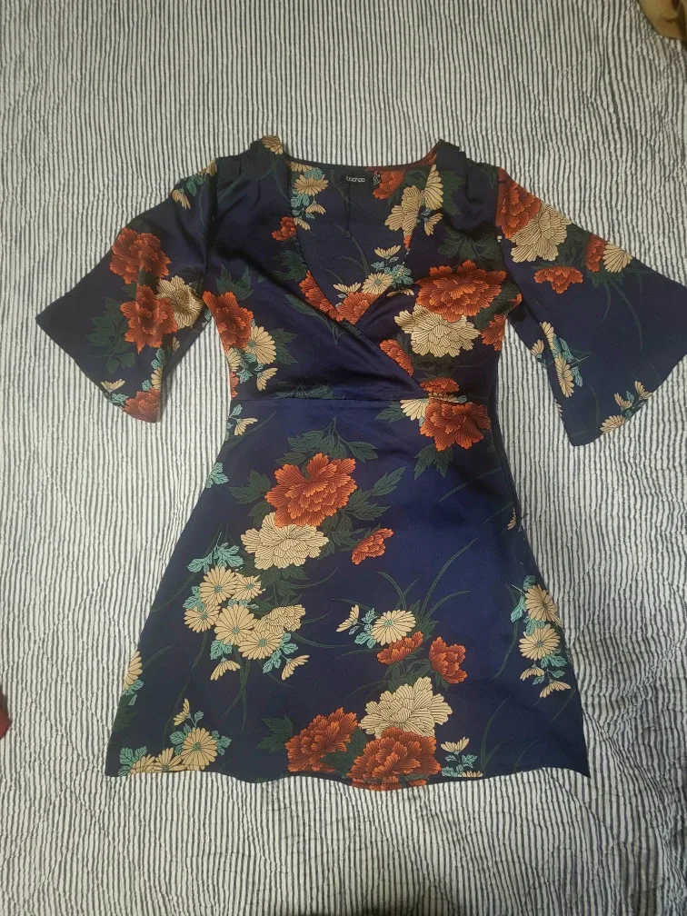 Assorted dresses, skirts, and tops #Cleanout image indicator(9)