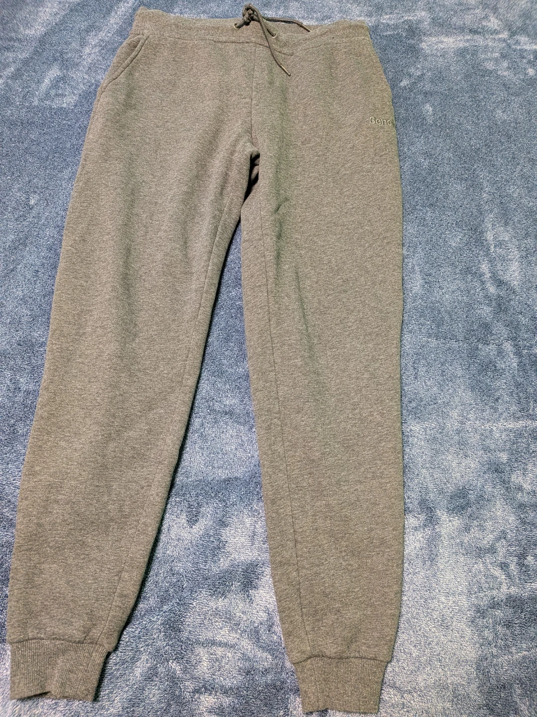 Package of 5 pairs of pants size small for men and 2 hoodies