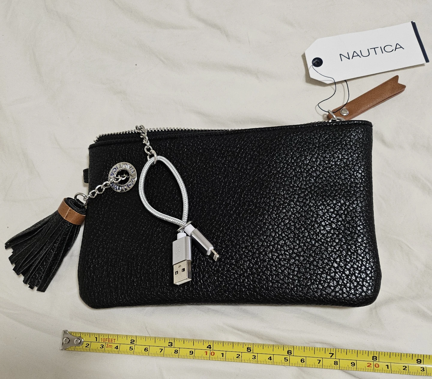 Nautica power sailing wristlet with battery charger   ￼