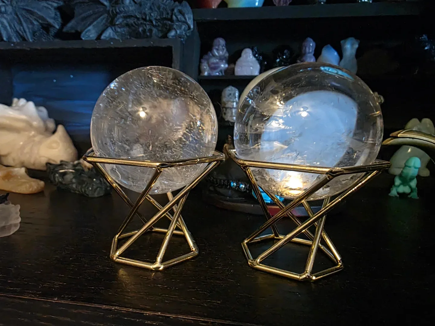 Two clear quartz Crystal spheres with Gold Stands