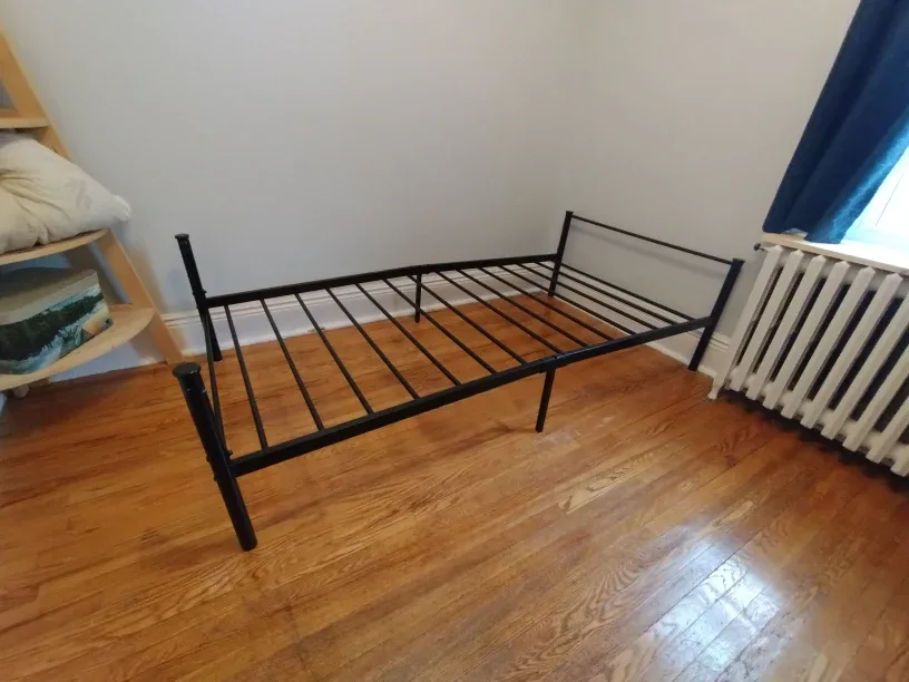Black Metal Bed Frame with mattress and sheets image indicator(4)