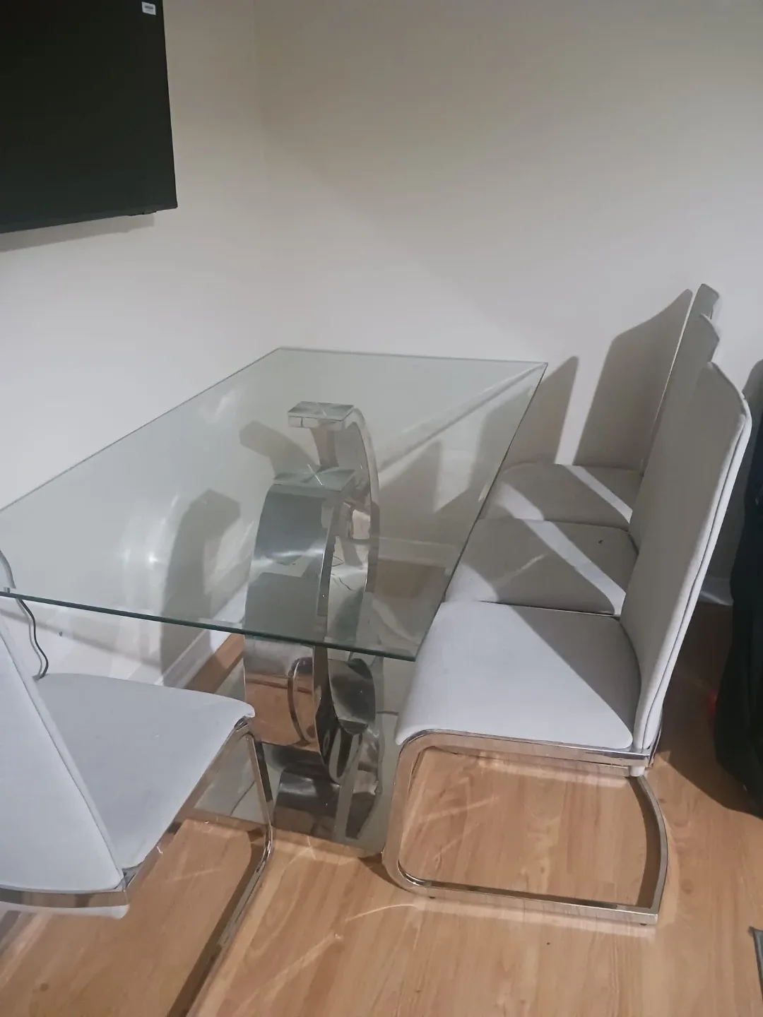 Glass Dining Table with 4 White Chairs image indicator(3)