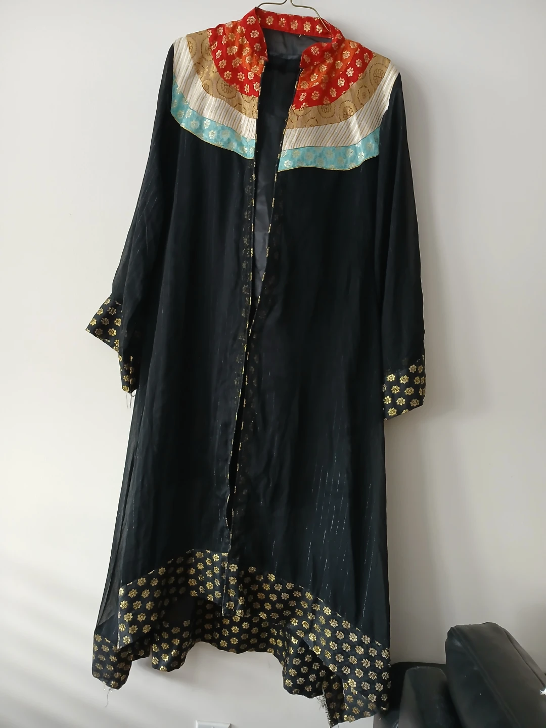 Black gown with Gold Detailing