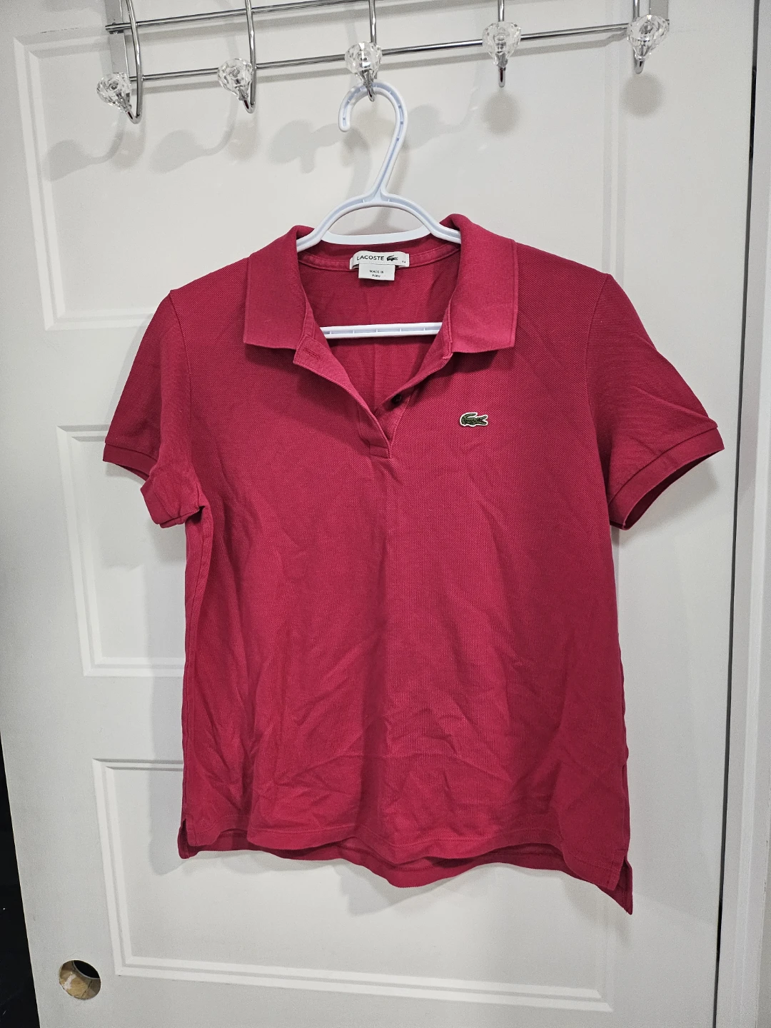 Polo Lacoste rose taille 44