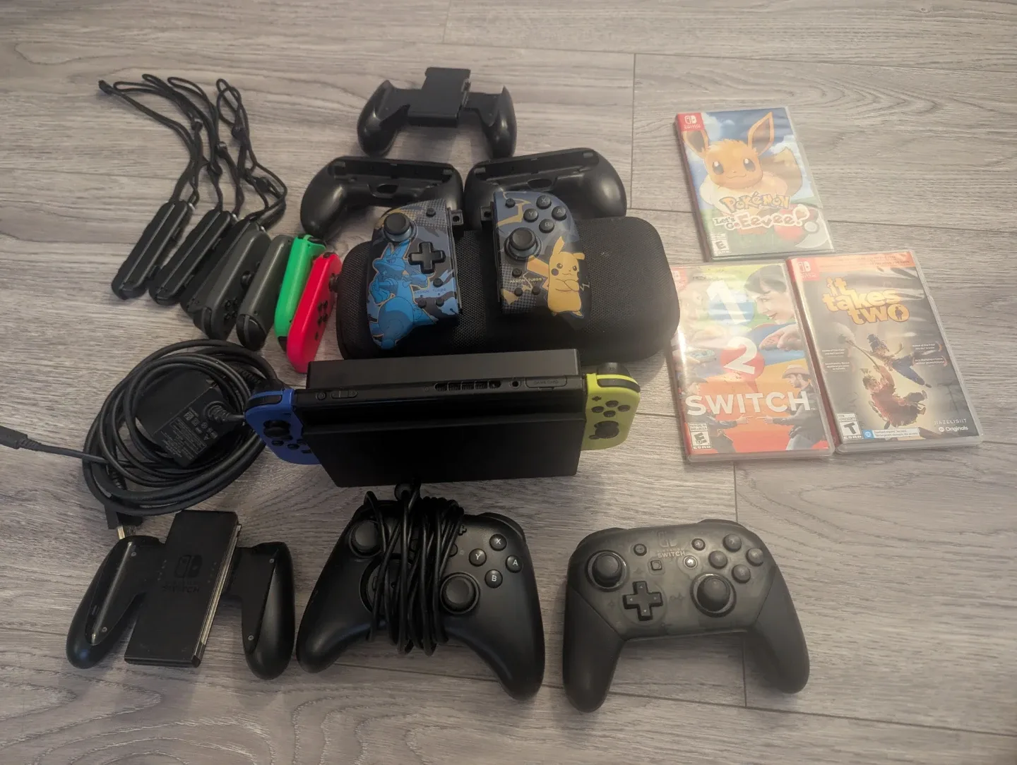 Nintendo switch with accessories and games