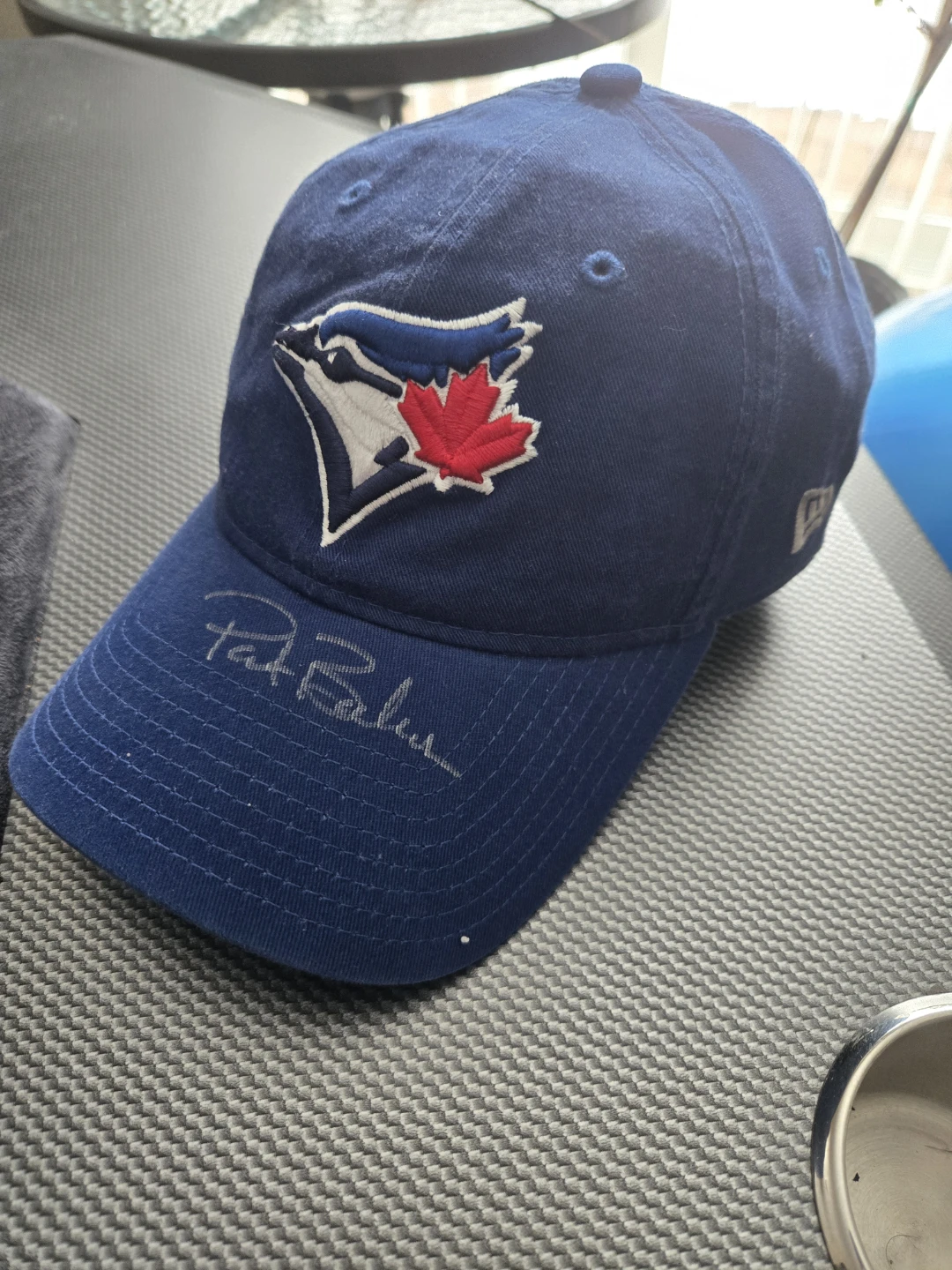 SIGNED PAT BORDERS TORONTO BLUE JAY HAT OR A SIGNED BASEBALL