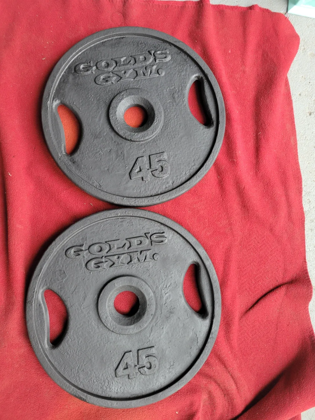 SET OF 45s. TOTAL 90LBs. GOLD'S GYM