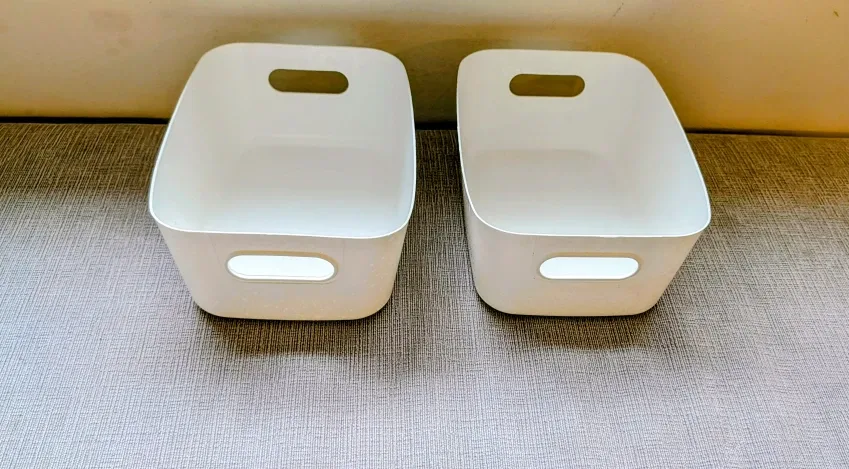 Two White Storage Containers