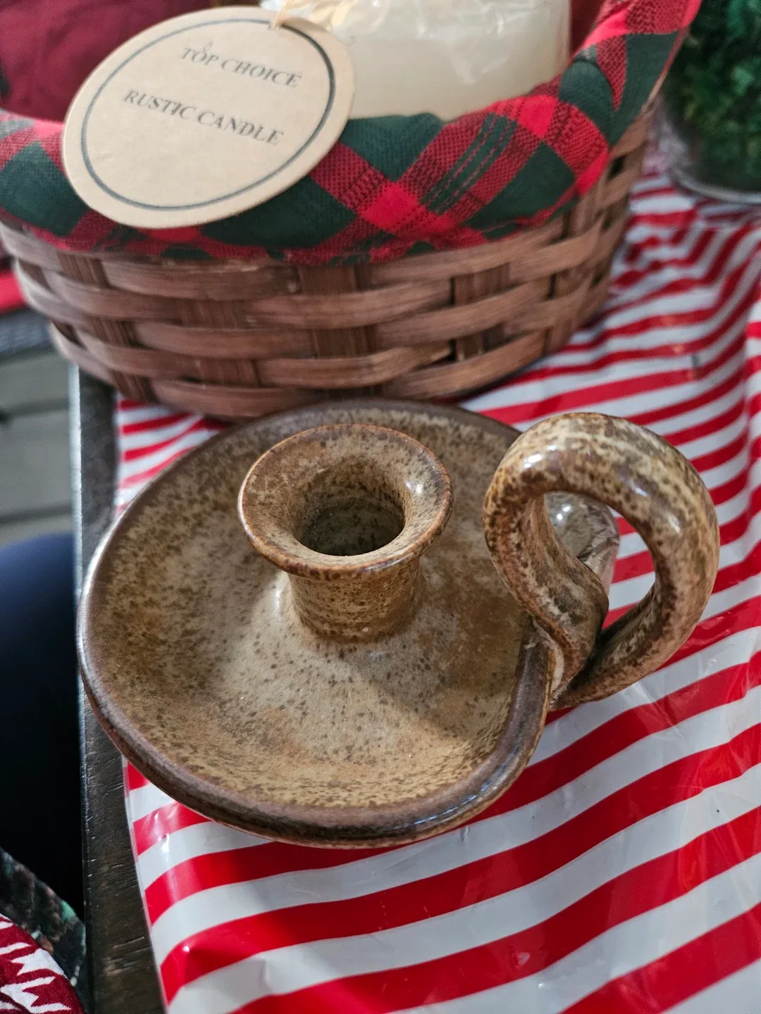 Basket filled with vintage jug, candle gilder, candle image indicator(3)