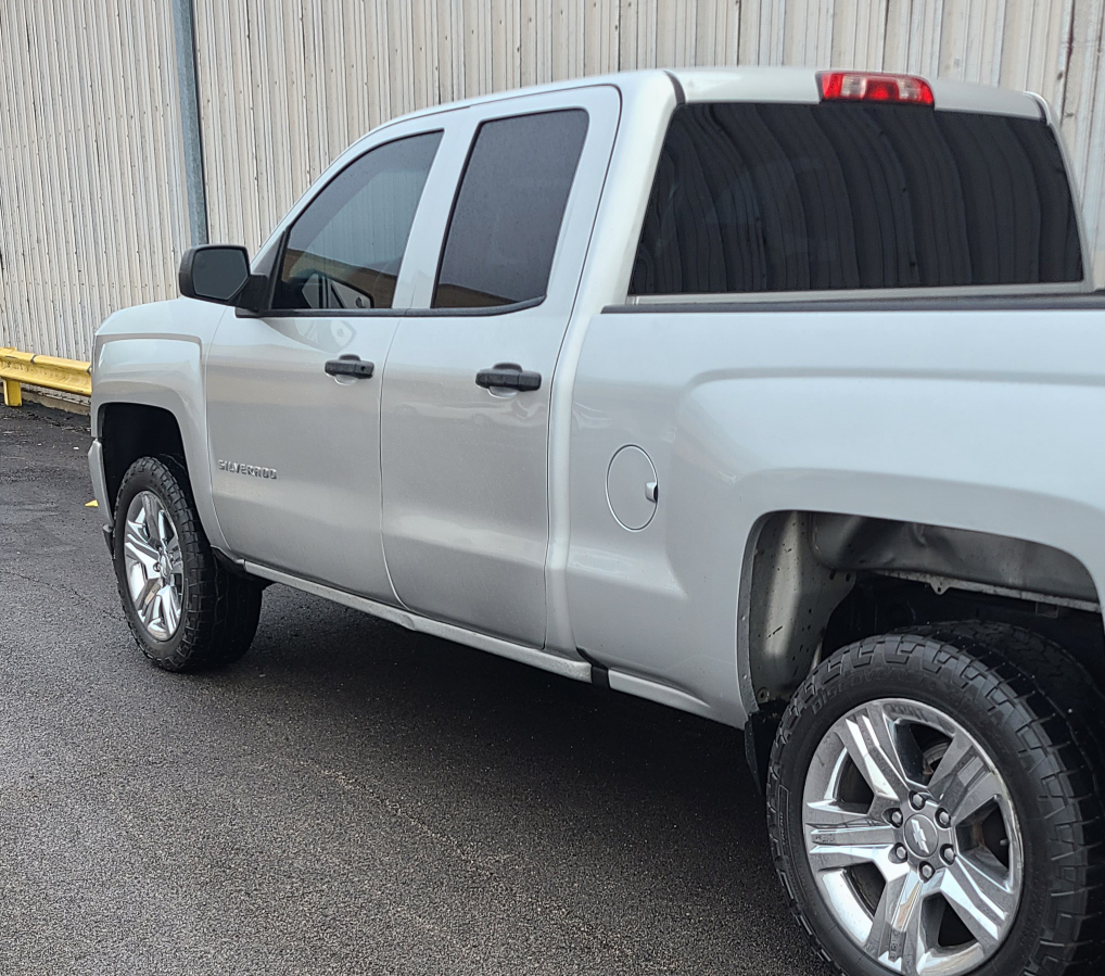 Silver Chevrolet Silverado Truck