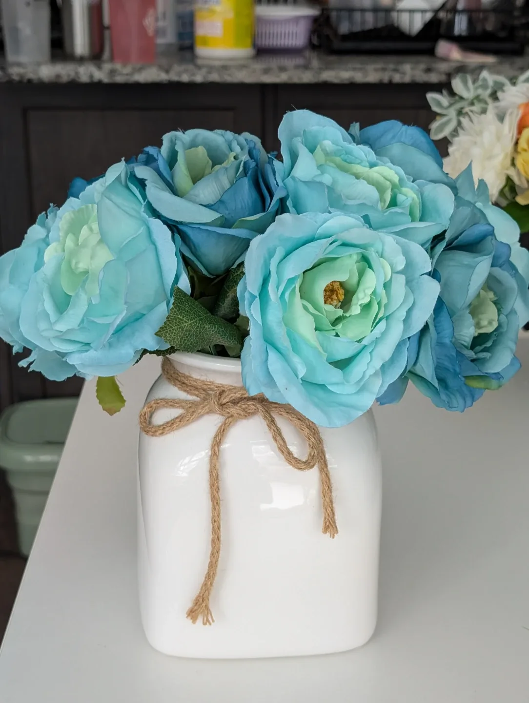 Blue Roses in White Vase