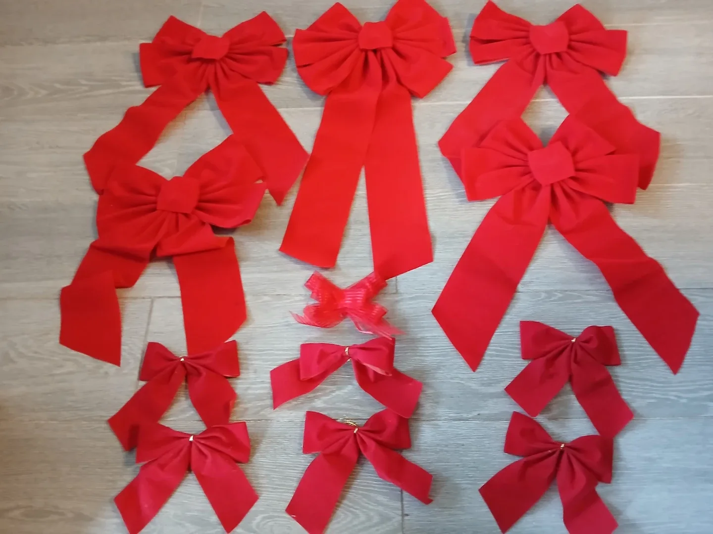 Set of 12 Red Christmas Bows available. Firm price.