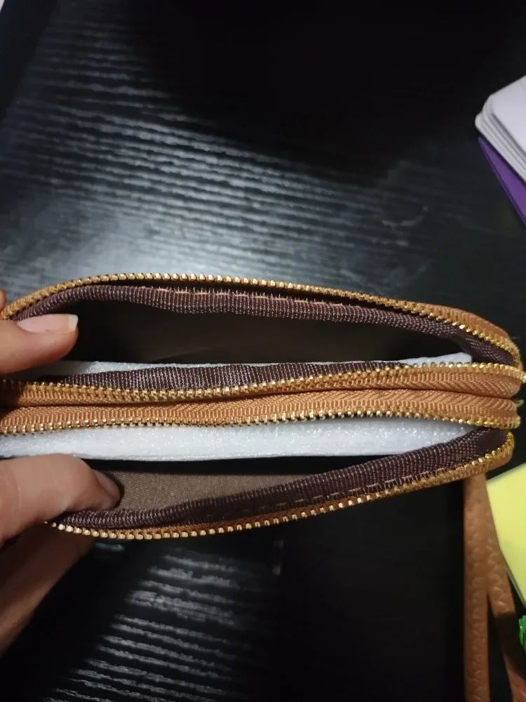 Brown wallet image indicator(3)