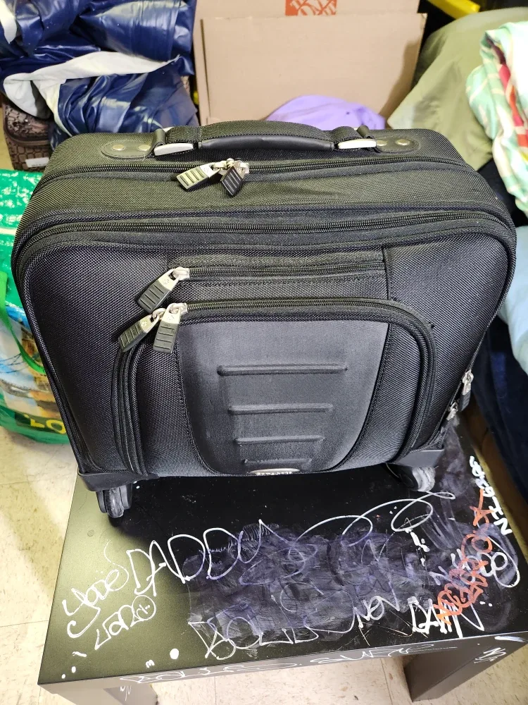 Samsonite Black Rolling Suitcase