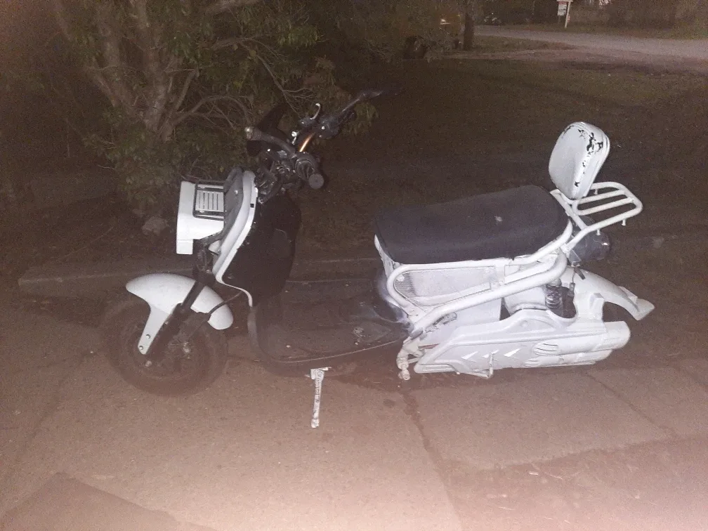Damaged White E-Bike Scooter
