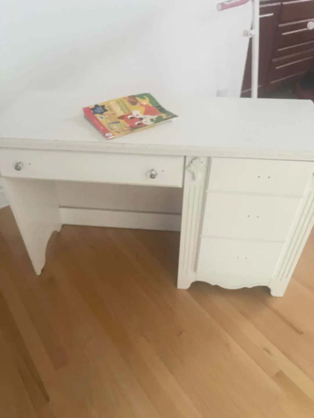 White vanity and white mirror