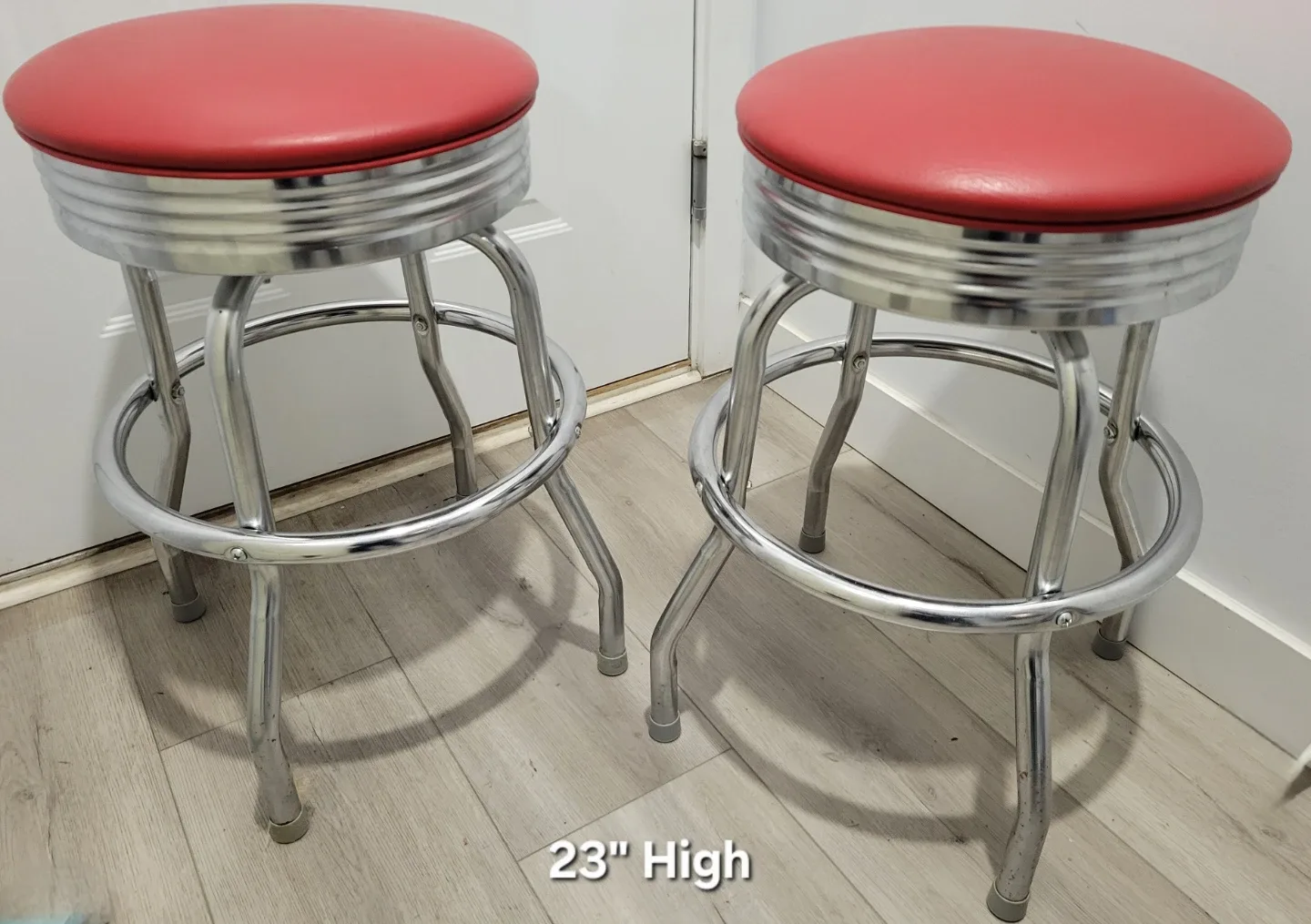 Beautiful Retro Red Swivel Bar Stools - 23" High. $60 Each.
