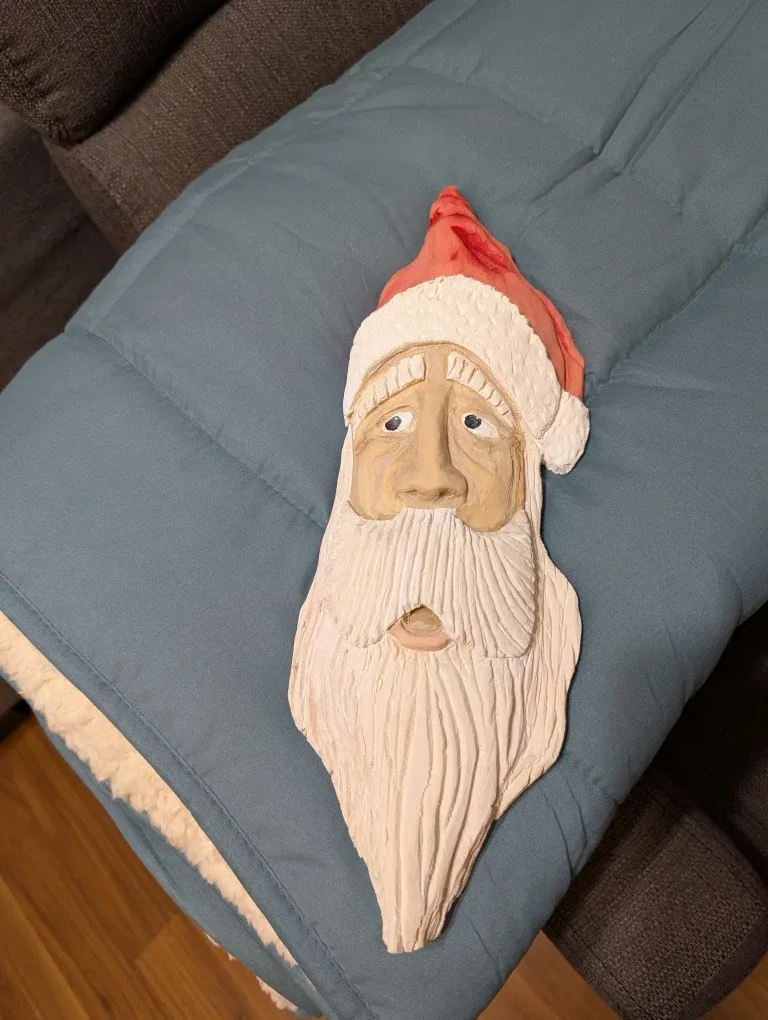 Hand Carved santas image indicator(2)