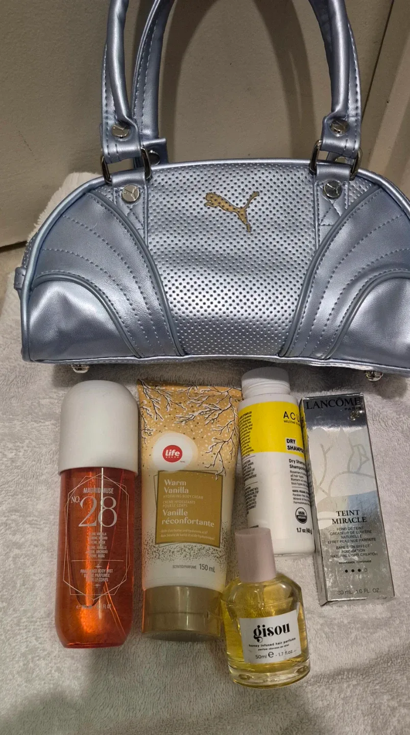 Puma bag , filled with all new perfumes  and lotions