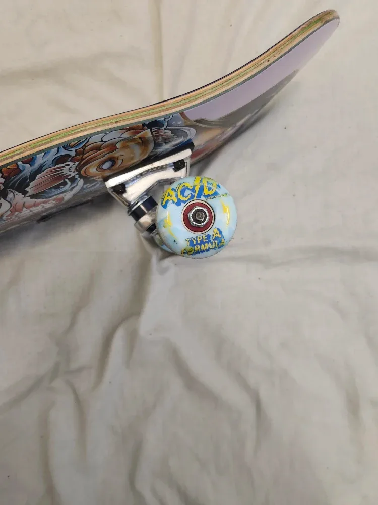 DGK Skateboard Deck with Acid Wheels image indicator(3)