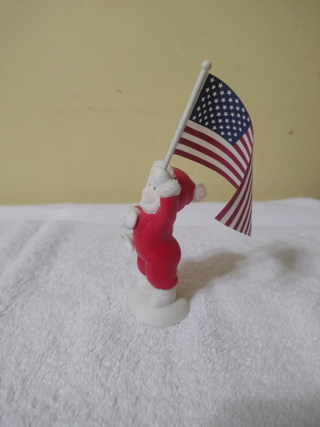 Santa Holding US Flag Figurine image indicator(2)