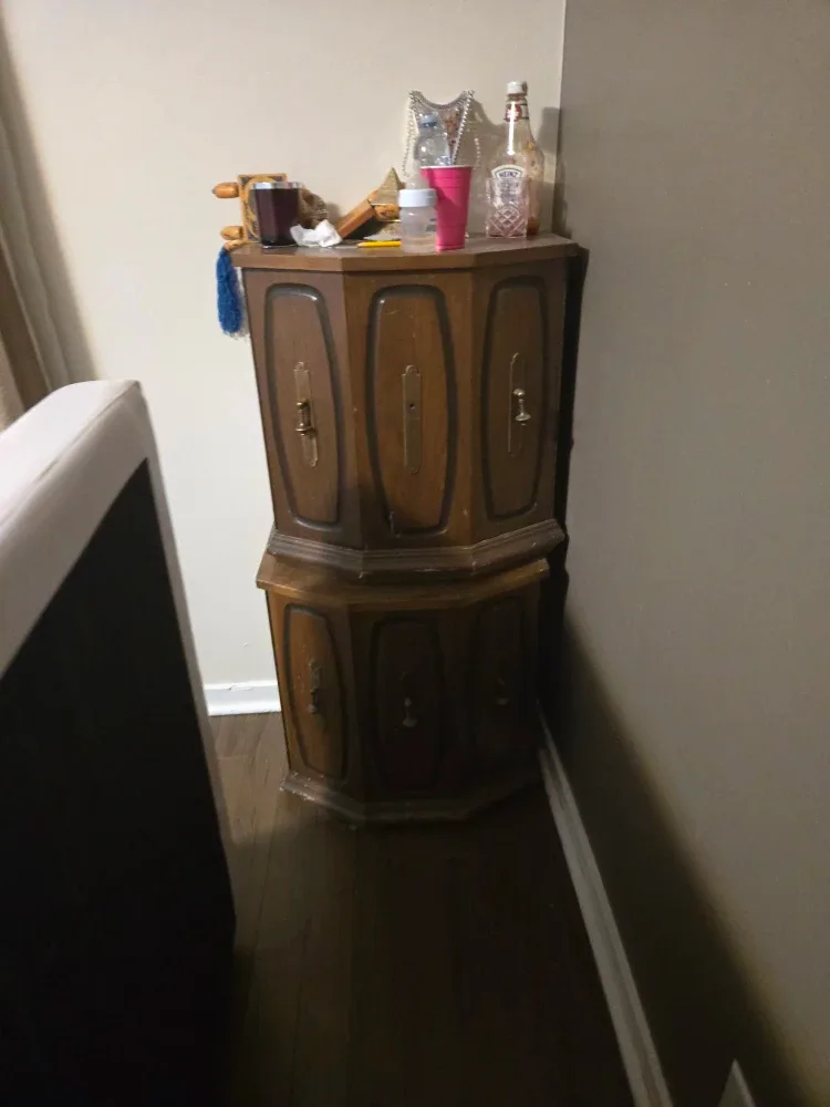 vintage wooden corner cabinet or corner storage cabinet.