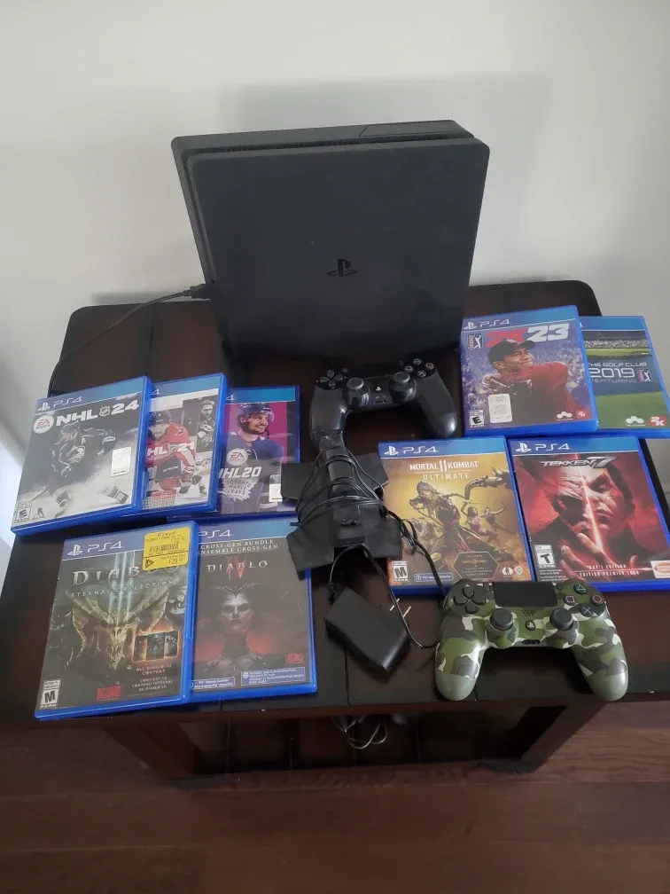 PlayStation 4 with Games and Controllers