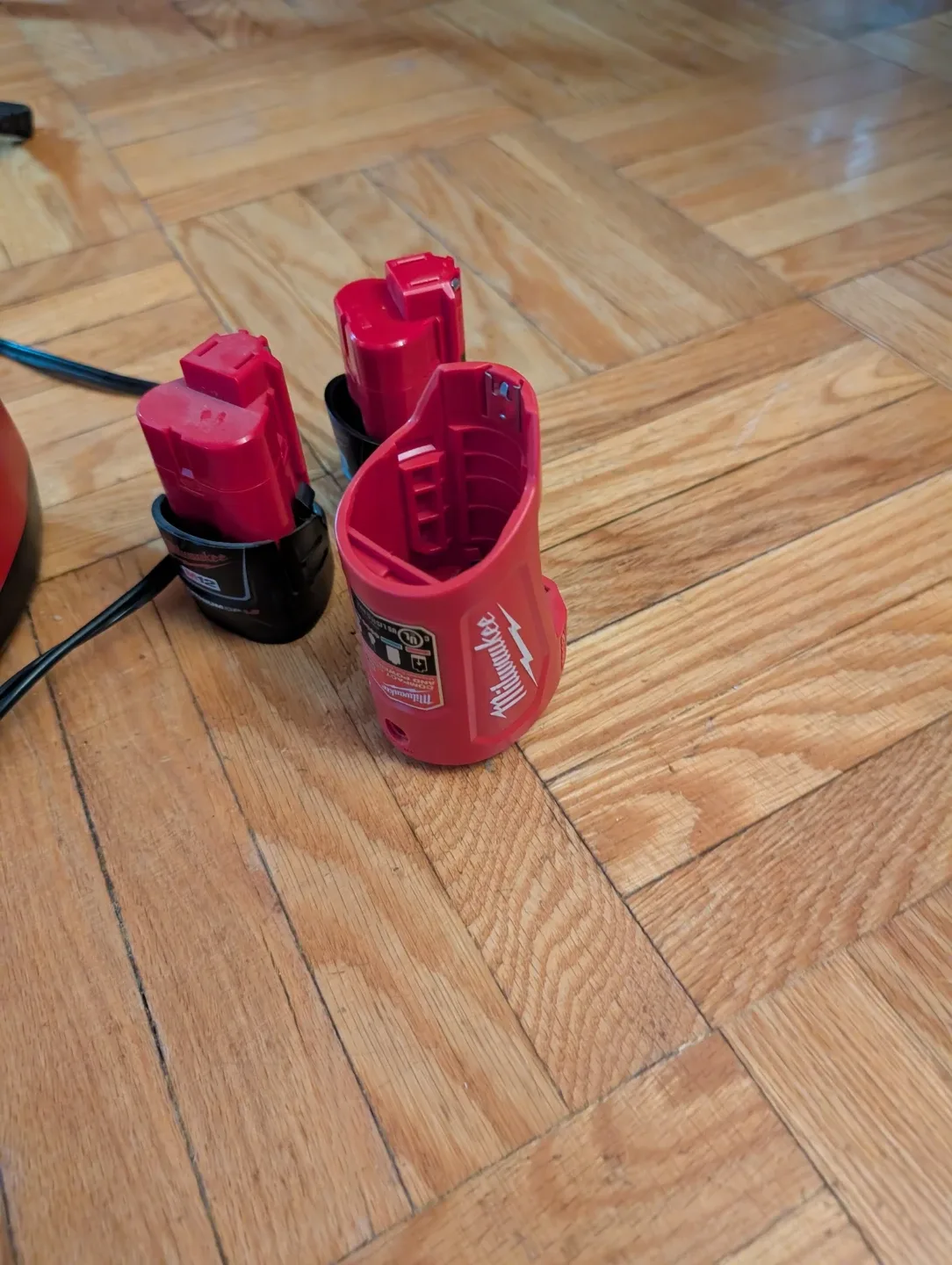 Milwaukee M12 Battery Charger & 3 Batteries image indicator(2)