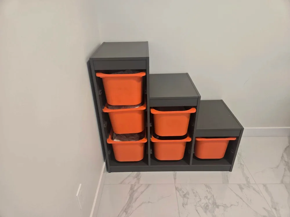 Grey Shelf with Orange Storage Bins