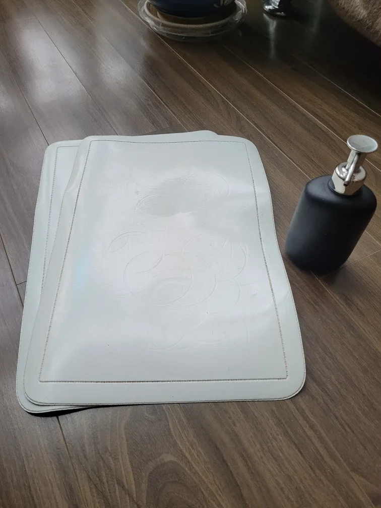 White Placemats & soap dispenser