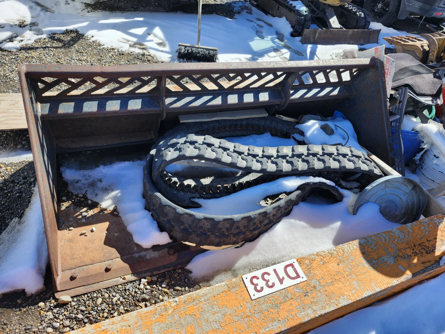 Skid Steer Bucket Attachment with Track