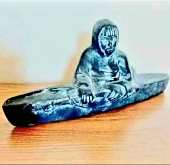 Unique Inuit Hand Carved Stoneware Seal Hunter Kayak Statue