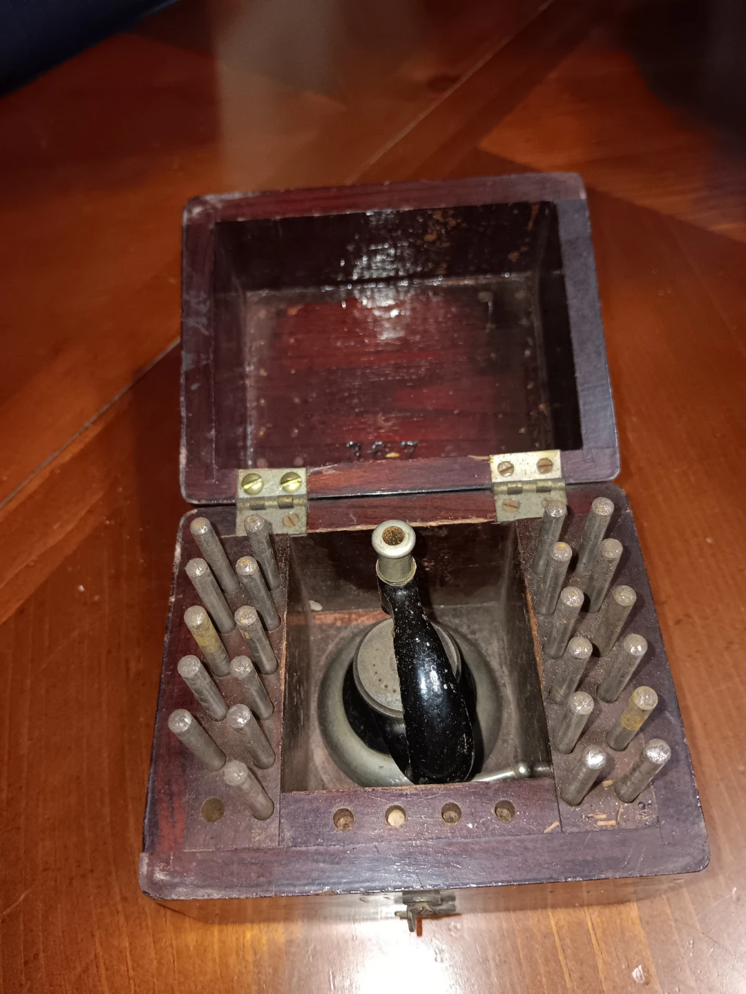 Wooden Box with antique watch maker staking tools