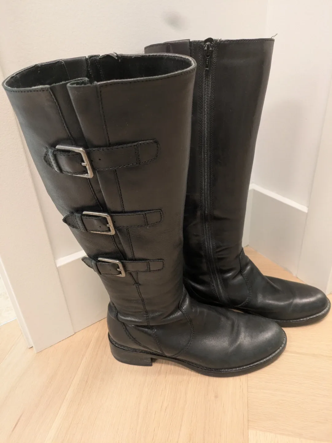 Tall black leather boots