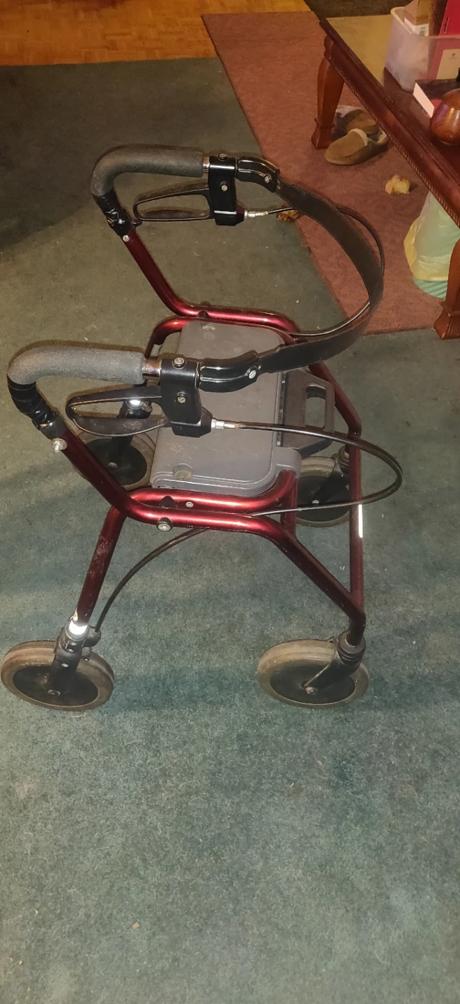 Red Four-Wheel Walker