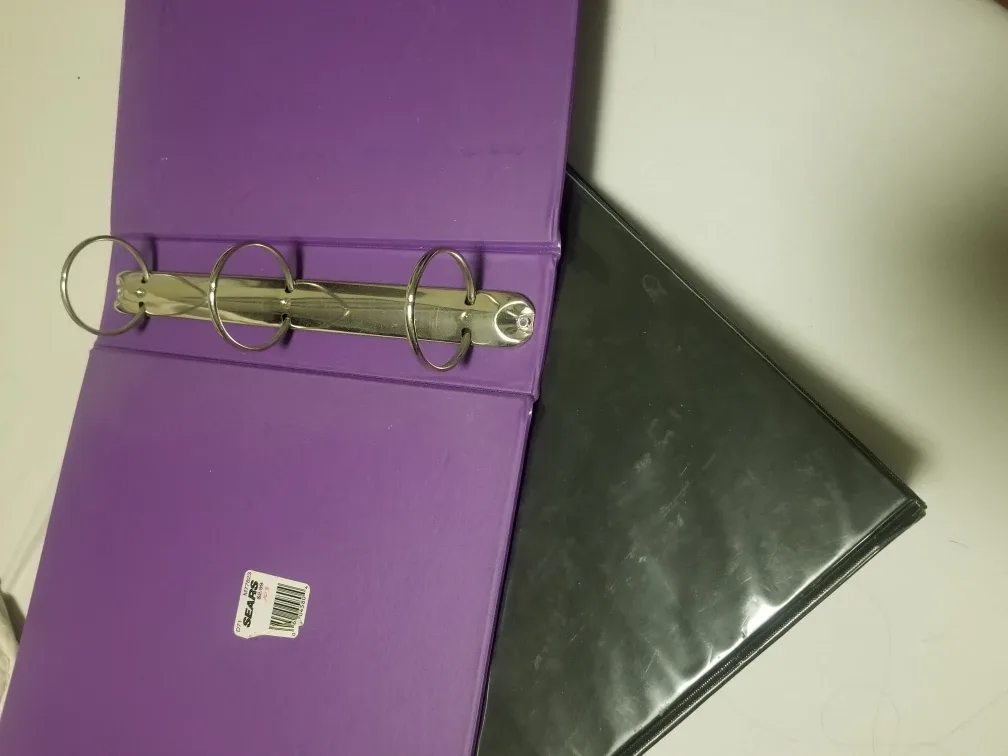 Two Binders: Black and Purple image indicator(2)